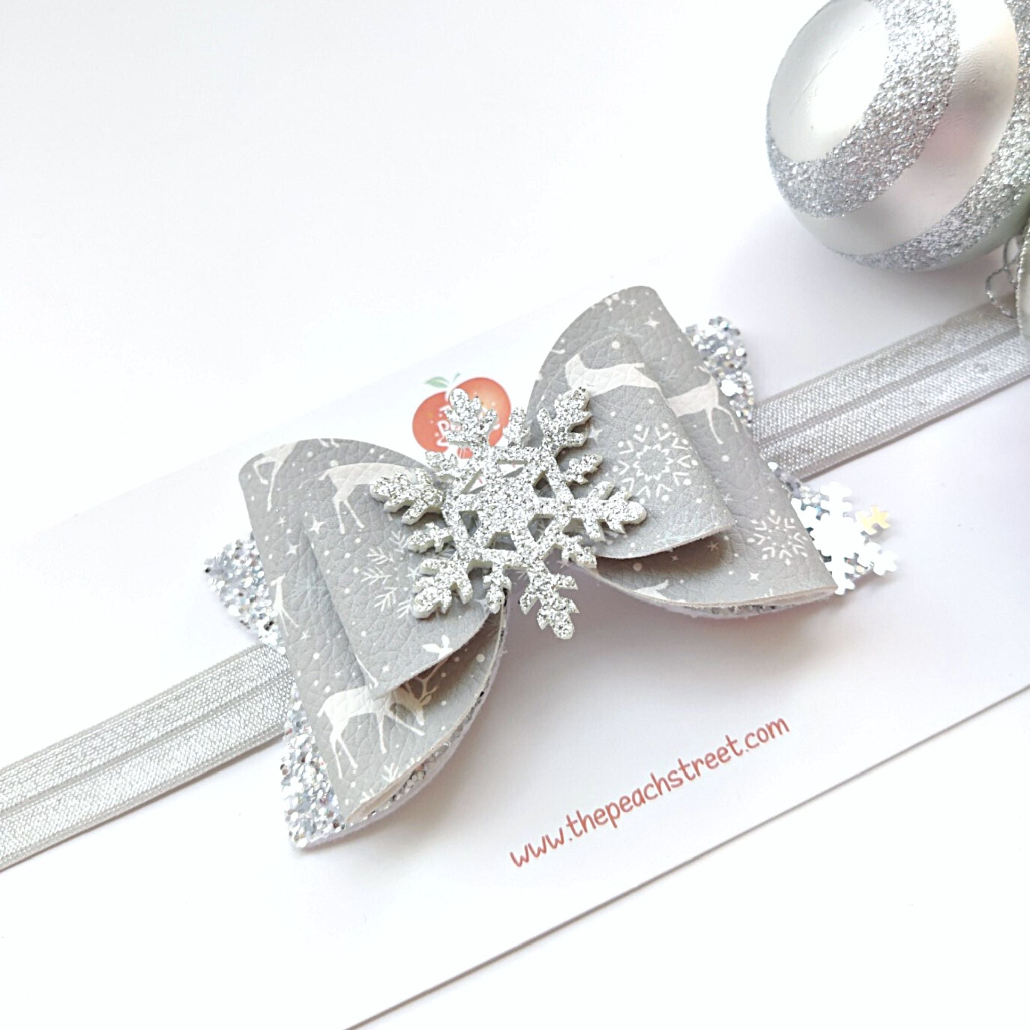 Reindeer Print Snowflake Bow
